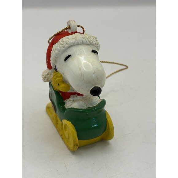 Vintage Peanuts PVC Christmas Ornament Santa Snoopy On Sleigh - Picture 1 of 6
